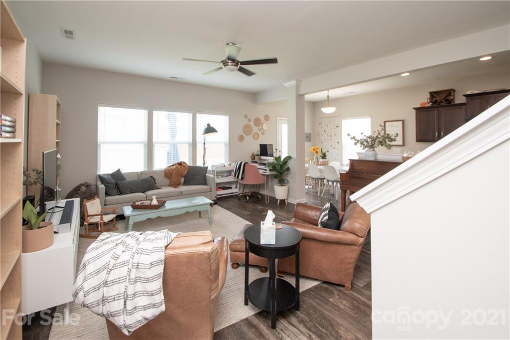 12511 Gotland Road, Unit 313 Midland, NC 28107 - Photo 5 of 31 a living room with furniture and a large window