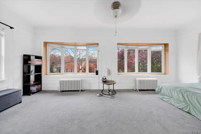 a room with furniture and window