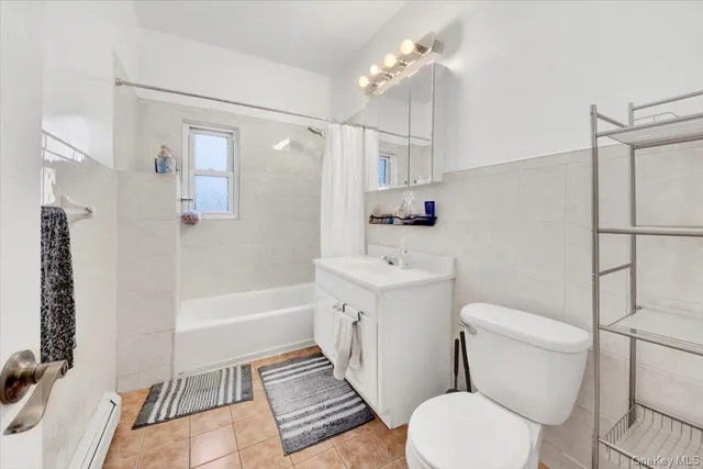 a backyard of a house with a garage