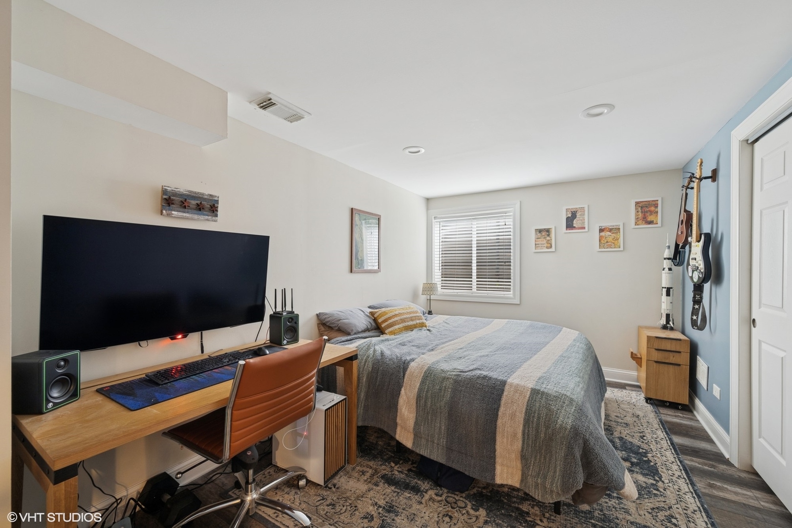 1046 Prairie Trail Grayslake, IL 60030 - Photo 11 of 17 a bedroom with a bed and a flat screen tv