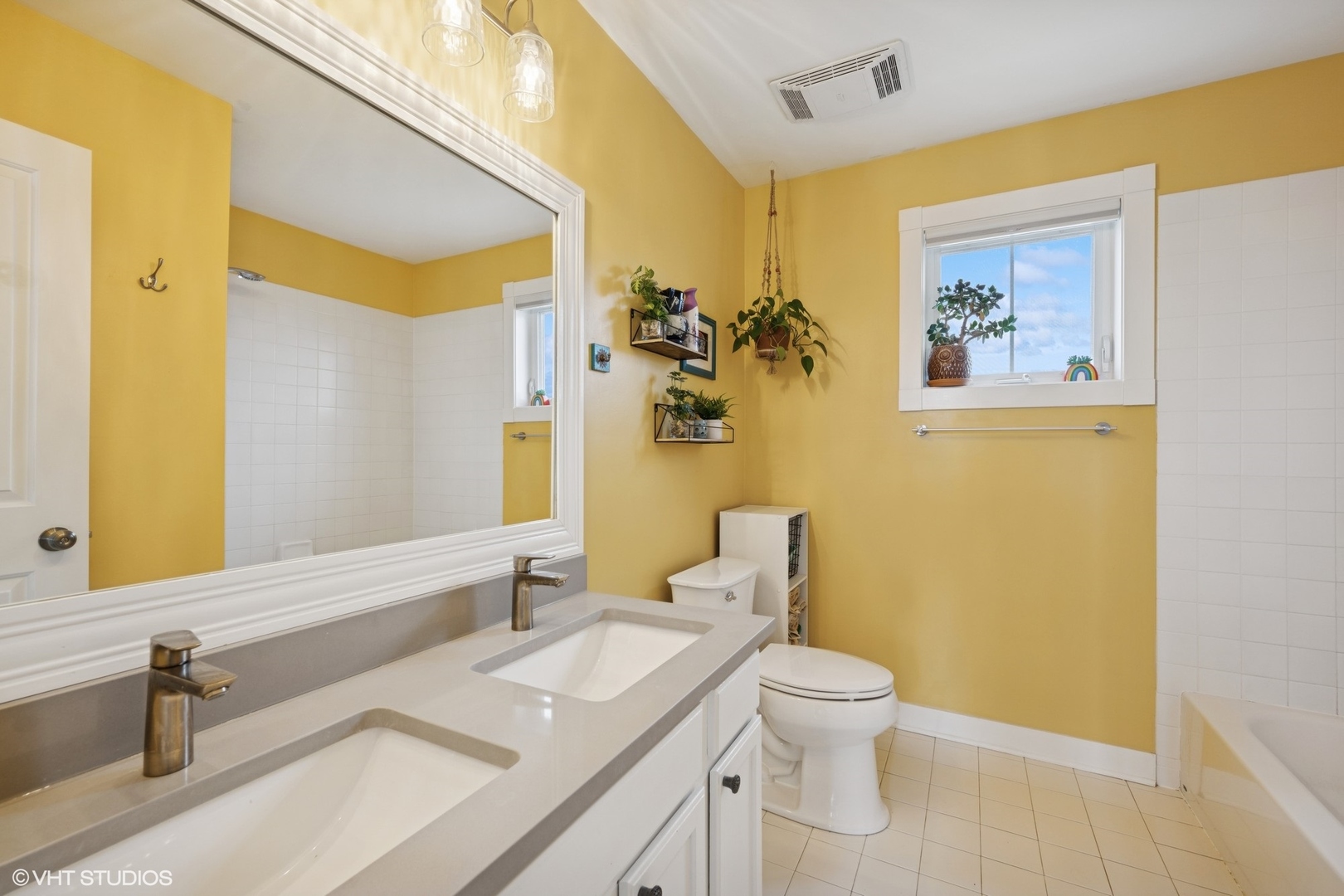 1046 Prairie Trail Grayslake, IL 60030 - Photo 12 of 17 a bathroom with a granite countertop sink a toilet and a mirror