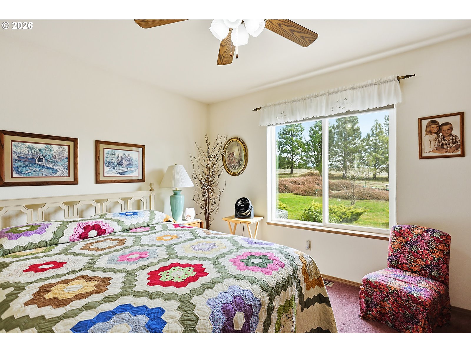64 Seely Drive Goldendale, WA 98620 - Photo 19 of 46 a bedroom with bed and a large window