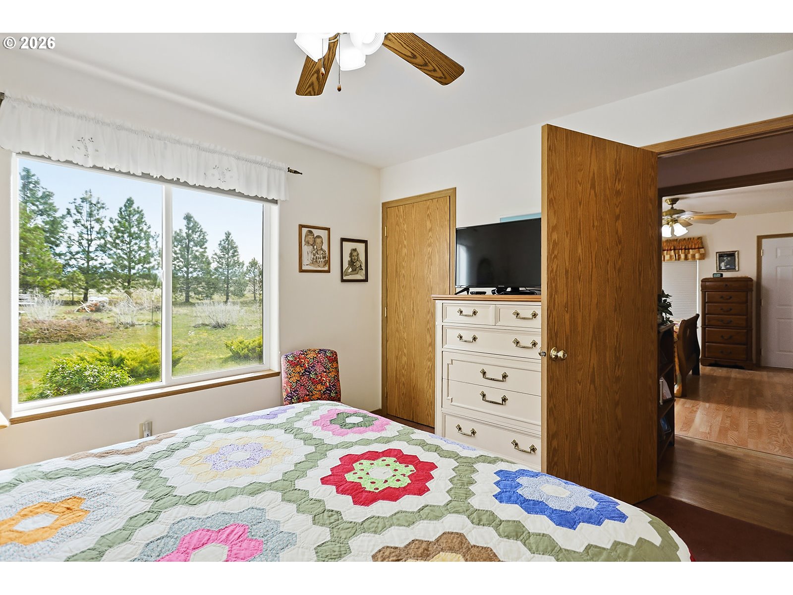 64 Seely Drive Goldendale, WA 98620 - Photo 20 of 46 a bedroom with a bed and a flat screen tv
