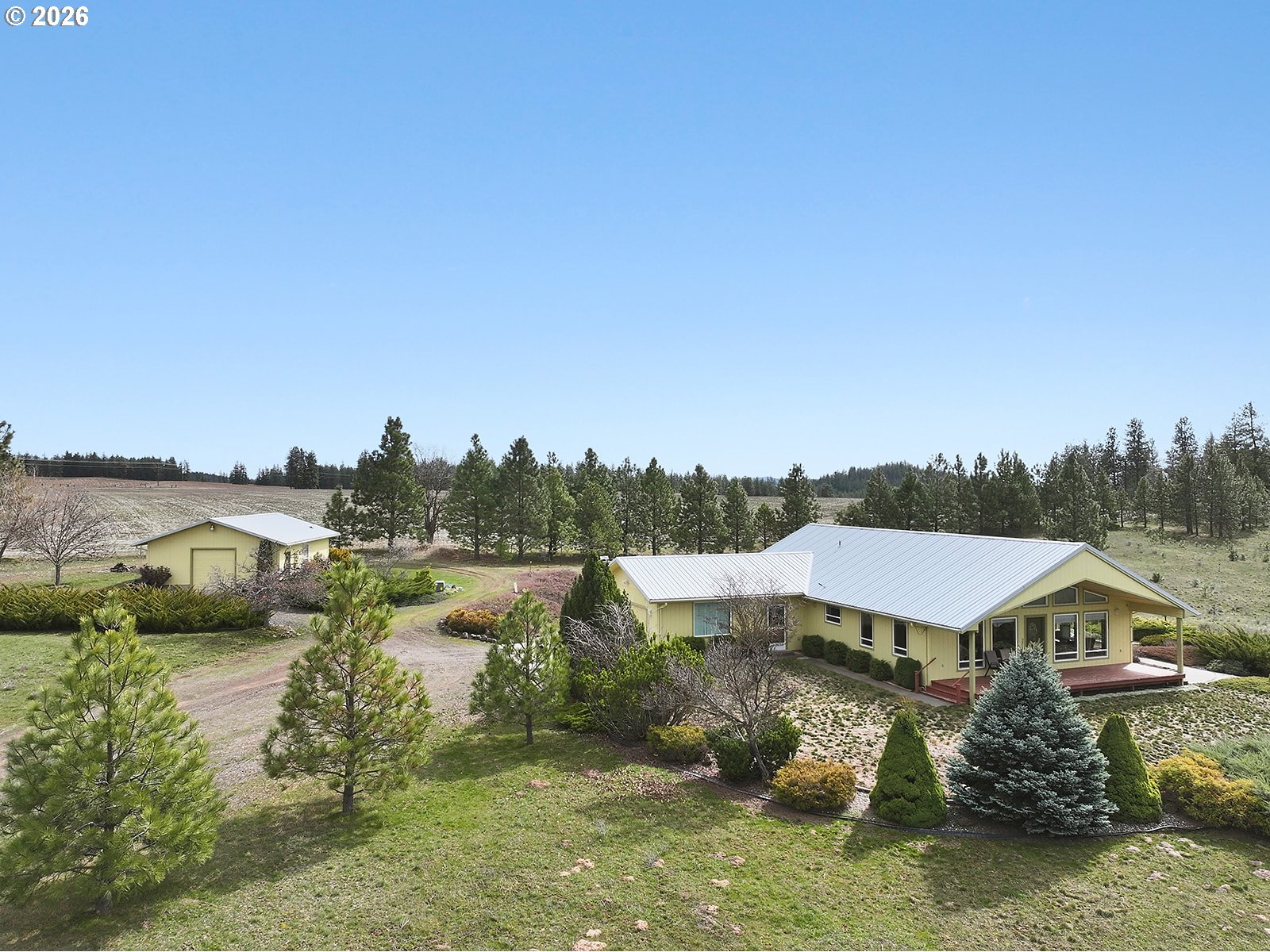 64 Seely Drive Goldendale, WA 98620 - Photo 2 of 46 a view of a lake with houses