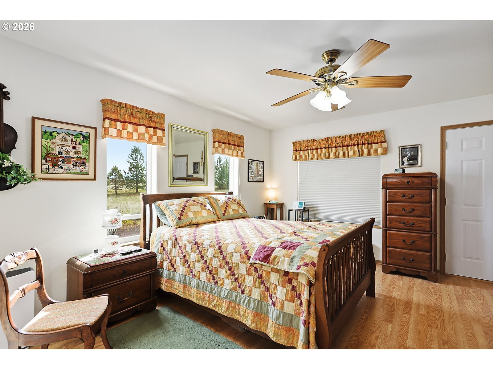 64 Seely Drive Goldendale, WA 98620 - Photo 21 of 46 a bedroom with a bed and wooden floor