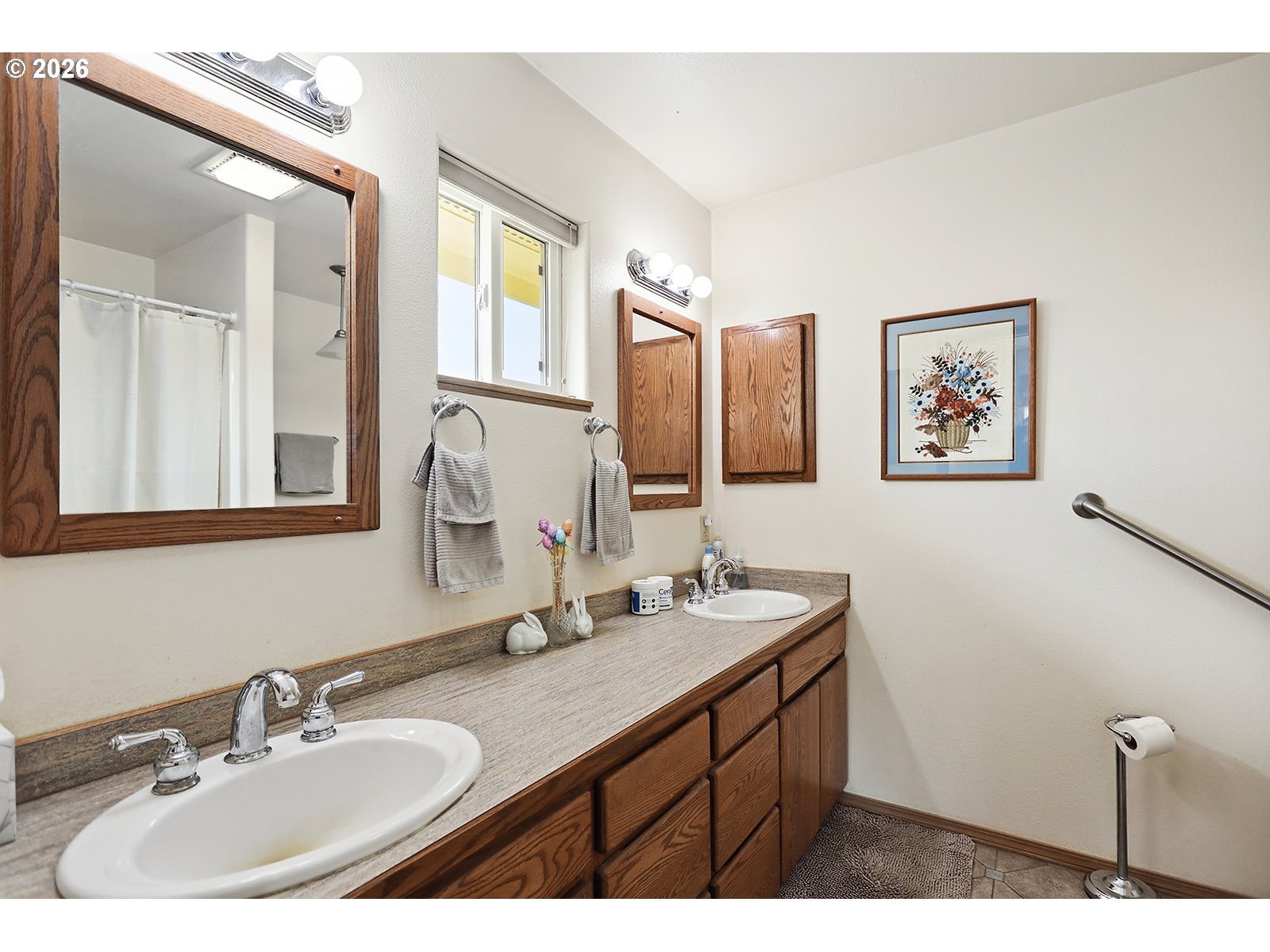 64 Seely Drive Goldendale, WA 98620 - Photo 27 of 46 a bathroom with a double vanity sink and a mirror