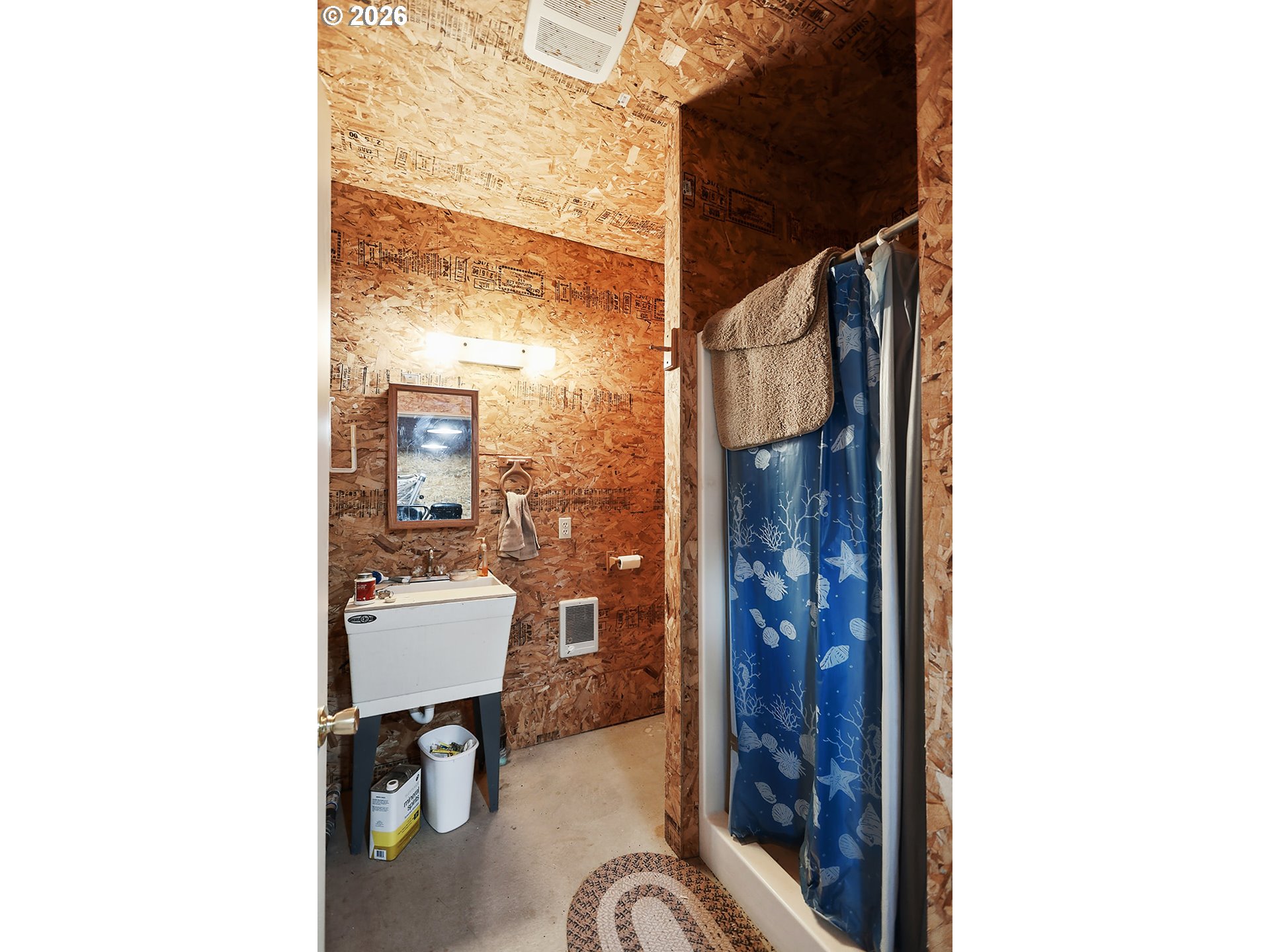 64 Seely Drive Goldendale, WA 98620 - Photo 34 of 46 a picture of a bathroom with a shower curtain