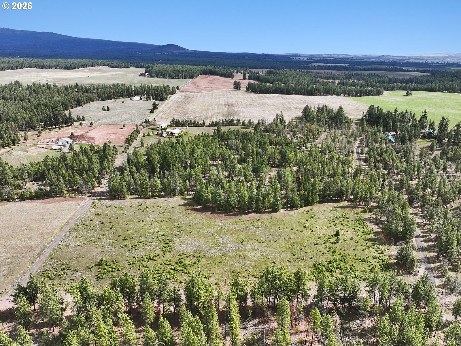 64 Seely Drive Goldendale, WA 98620 - Photo 39 of 46 a view of a lake with an outdoor space