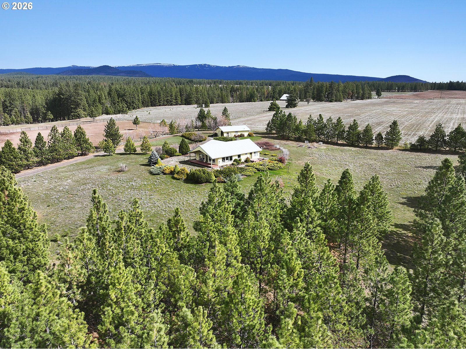 64 Seely Drive Goldendale, WA 98620 - Photo 42 of 46 a view of a lake with couches and city view
