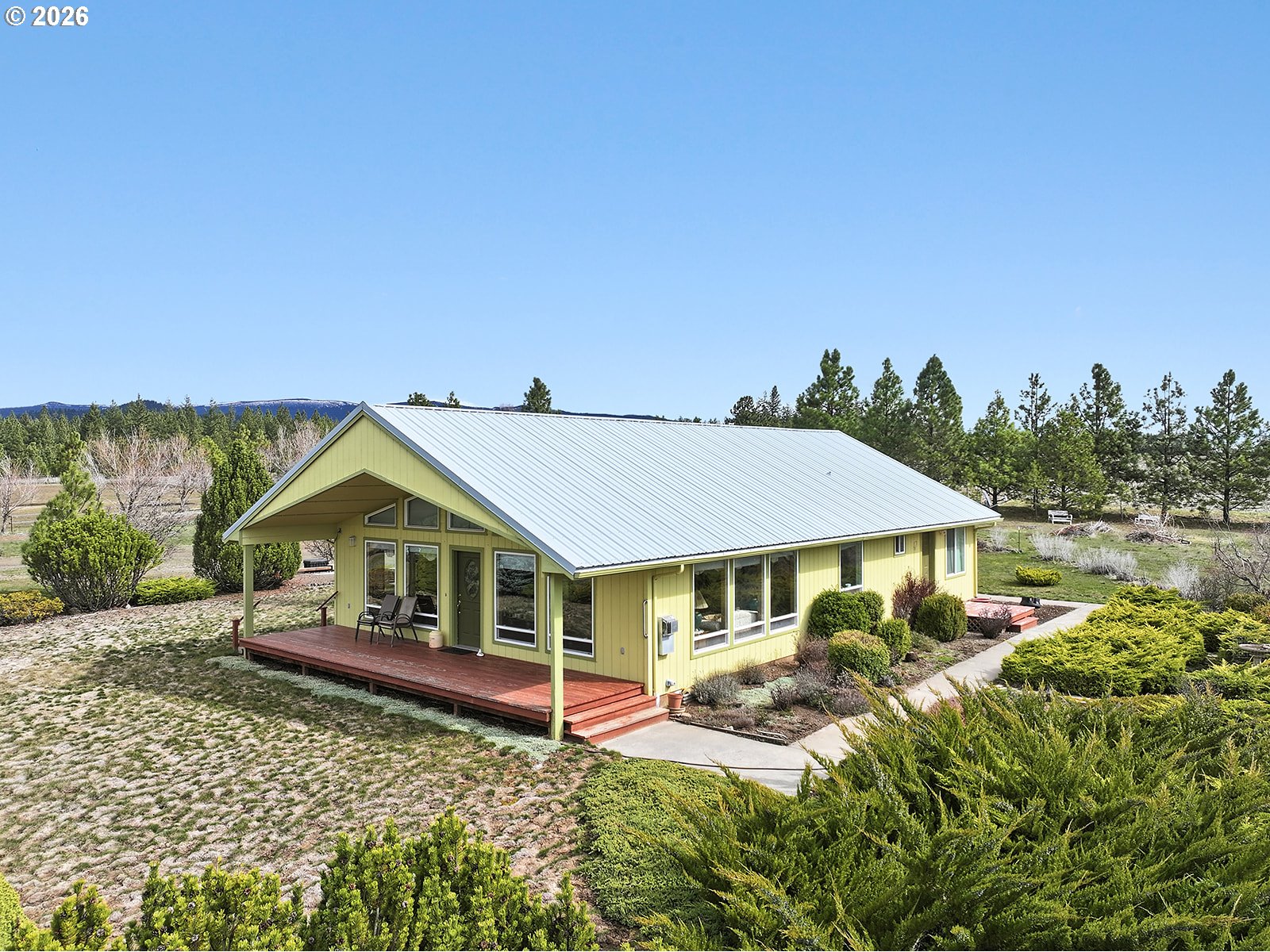 64 Seely Drive Goldendale, WA 98620 - Photo 44 of 46 a house with trees in the background