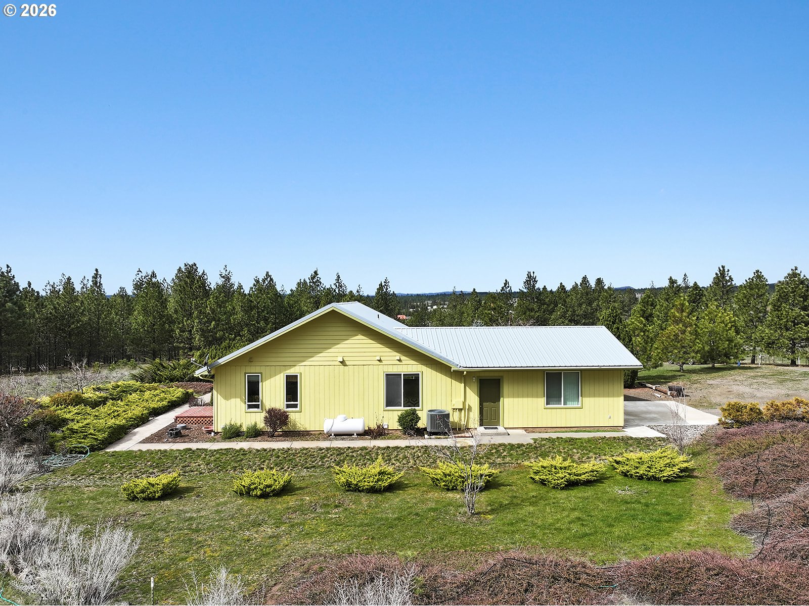 64 Seely Drive Goldendale, WA 98620 - Photo 45 of 46 a front view of a house with a yard