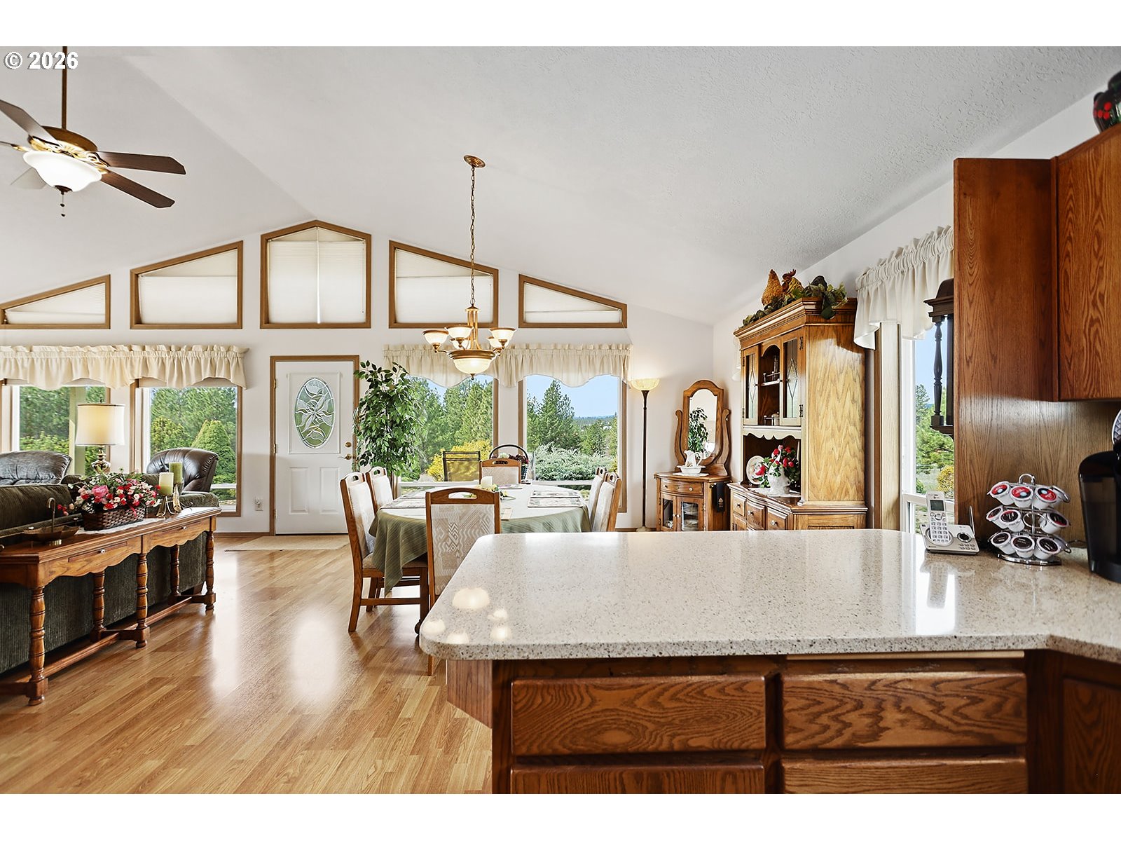 64 Seely Drive Goldendale, WA 98620 - Photo 6 of 46 a view of a living room and kitchen floor to ceiling windows