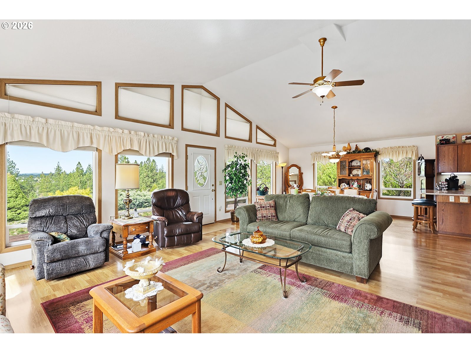 64 Seely Drive Goldendale, WA 98620 - Photo 8 of 46 a living room with furniture a rug and a chandelier