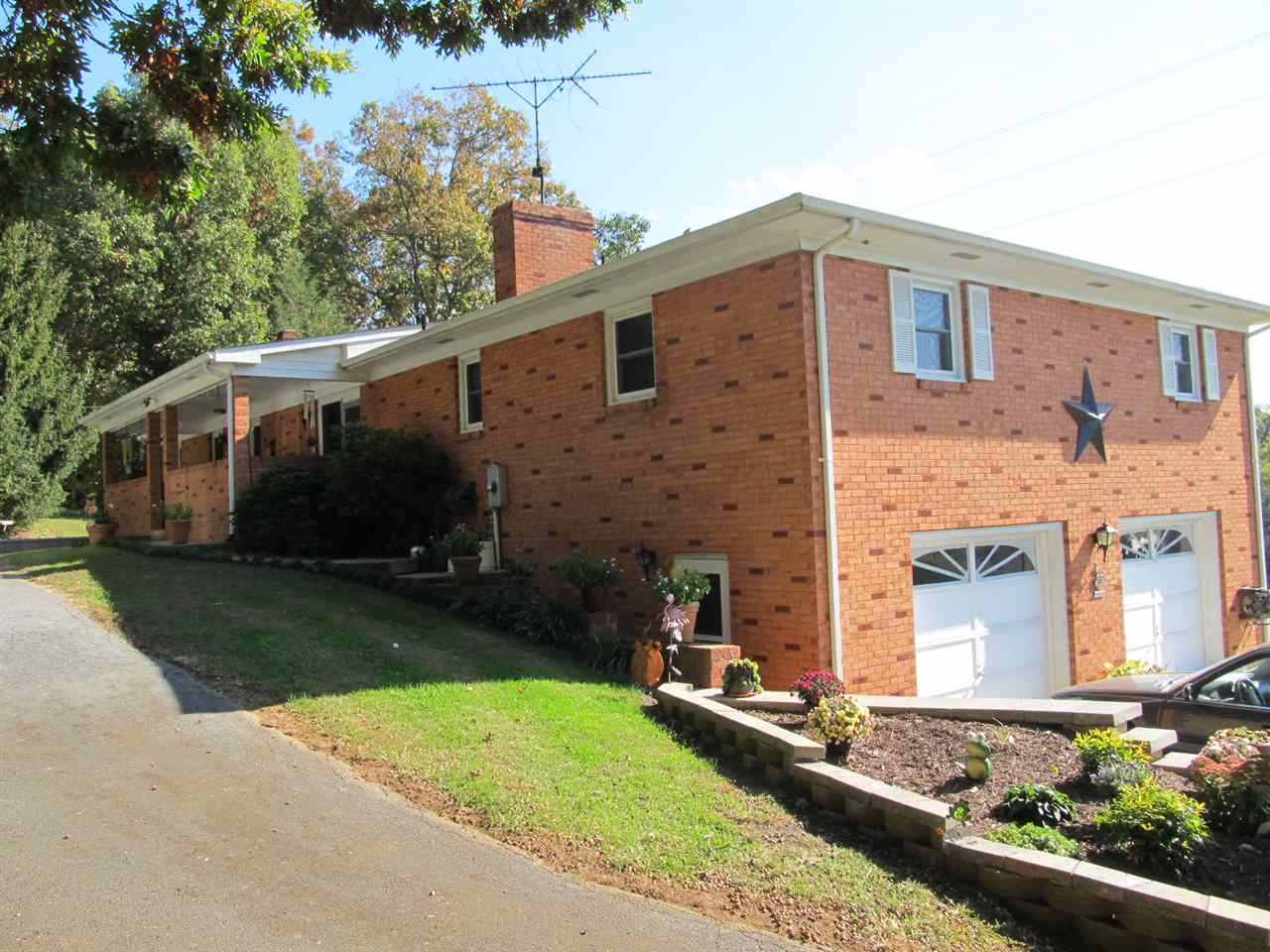218 Dooms Crossing Road Waynesboro, VA 22980 - Photo 20 of 24 a front view of a house with garden