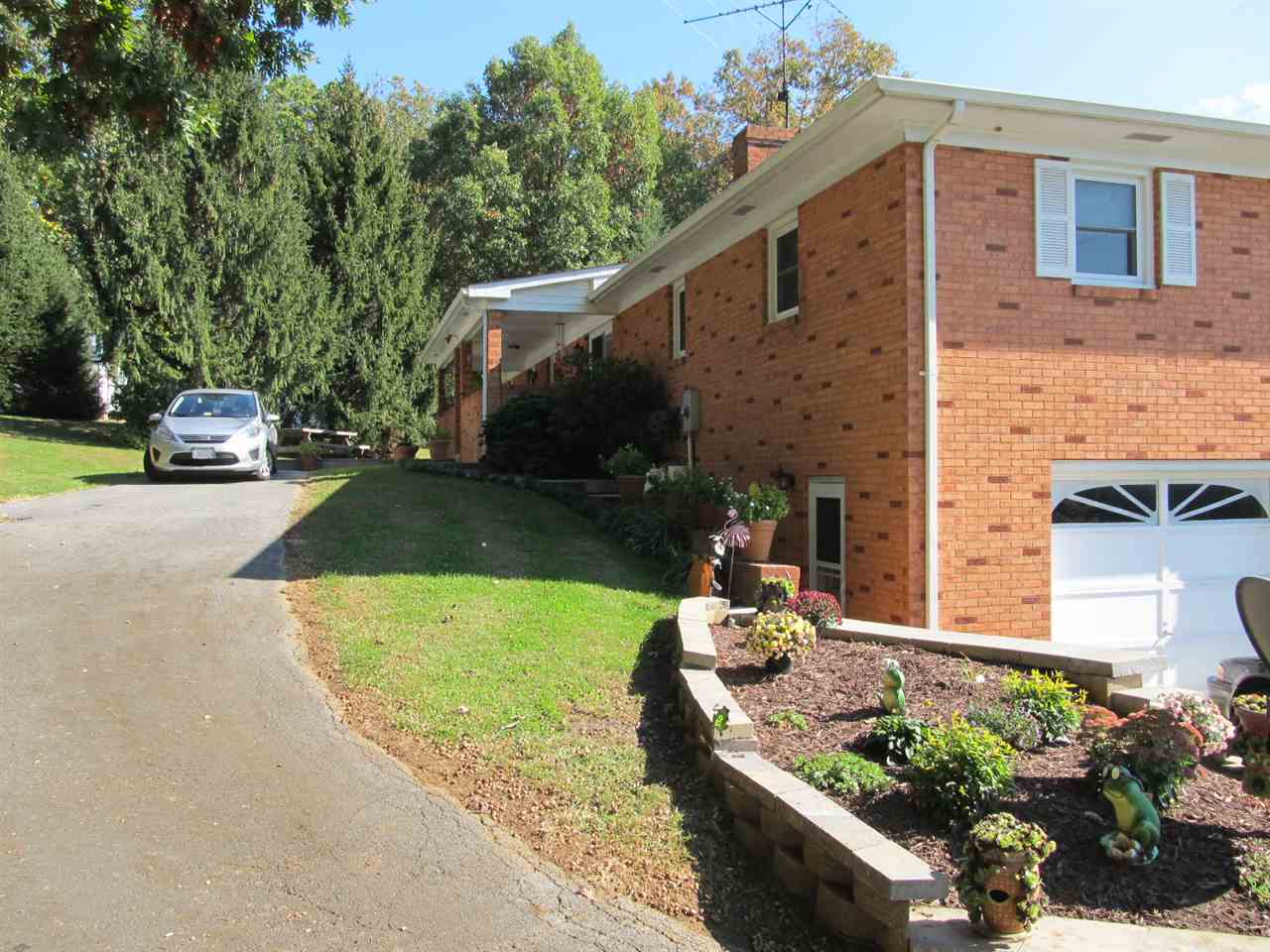 218 Dooms Crossing Road Waynesboro, VA 22980 - Photo 21 of 24 a front view of a house with garden