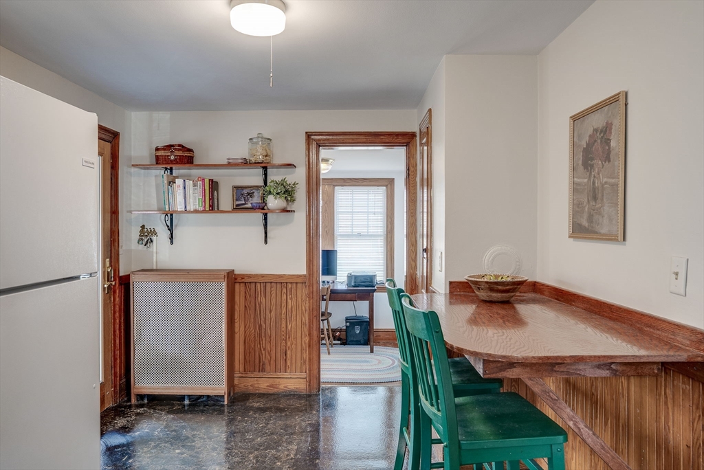 69 Bennett Street Wakefield, MA 01880 - Photo 15 of 27 a dining room with furniture and window