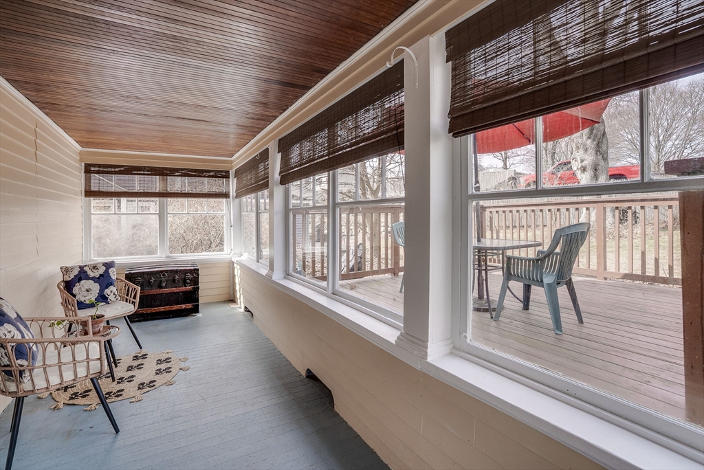 69 Bennett Street Wakefield, MA 01880 - Photo 19 of 27 a living room with furniture and windows