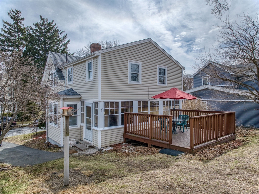 69 Bennett Street Wakefield, MA 01880 - Photo 3 of 27 a view of a house with wooden fence
