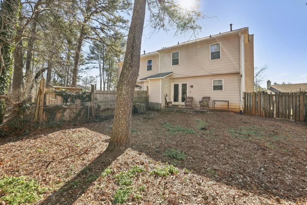 1331 North Hampton Road Alpharetta, GA 30009 - Photo 16 of 41 a view of a house with a yard