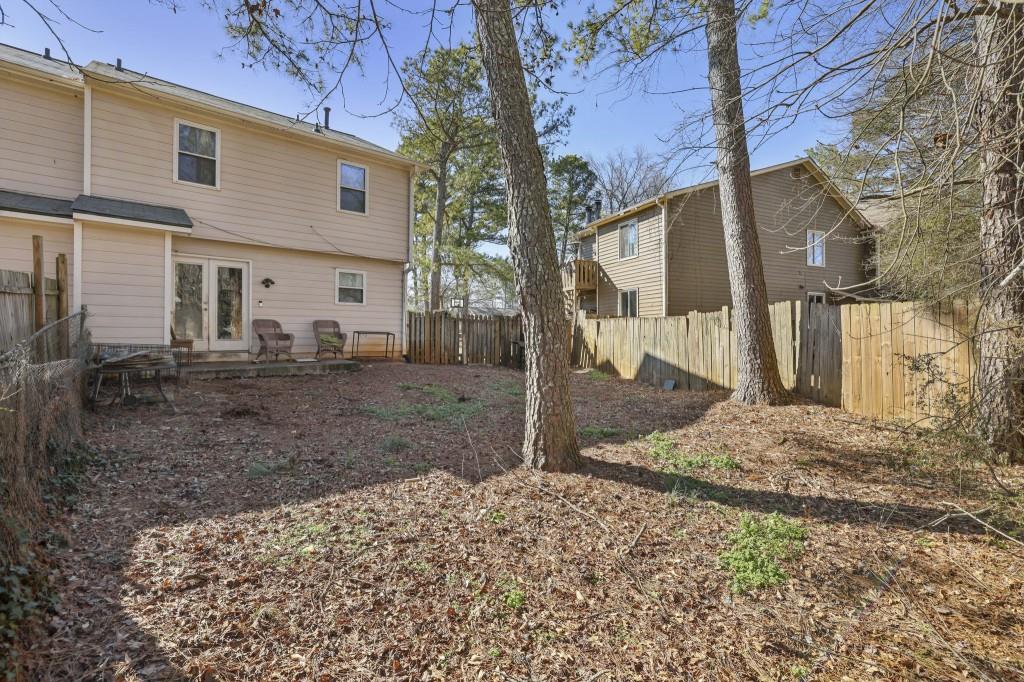 1331 North Hampton Road Alpharetta, GA 30009 - Photo 18 of 41 a view of a house with a yard covered in snow