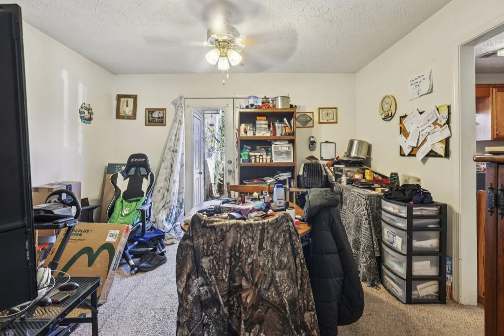 1331 North Hampton Road Alpharetta, GA 30009 - Photo 22 of 41 a view of a workspace with furniture and closet