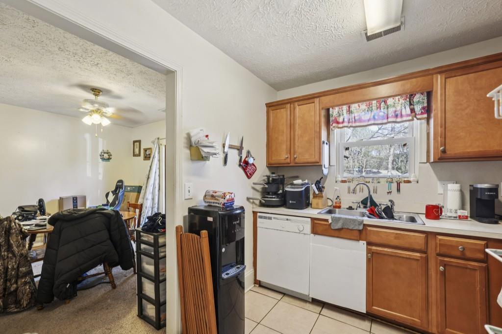 1331 North Hampton Road Alpharetta, GA 30009 - Photo 23 of 41 a room with sink a window and chairs
