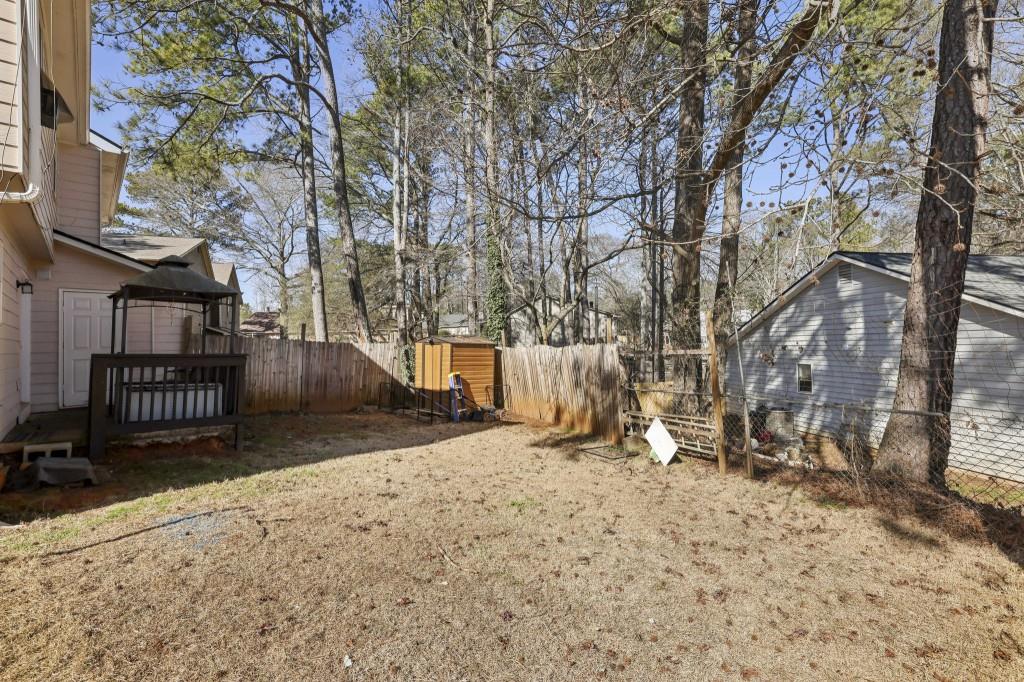 1331 North Hampton Road Alpharetta, GA 30009 - Photo 32 of 41 a view of a backyard with a tree