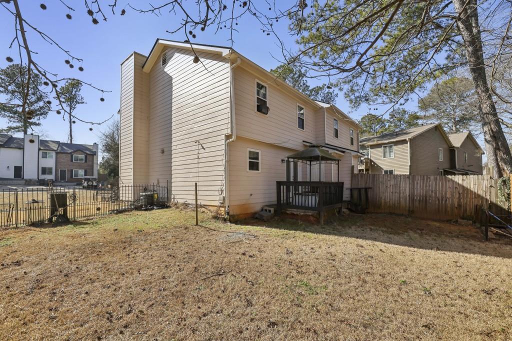 1331 North Hampton Road Alpharetta, GA 30009 - Photo 33 of 41 a view of a house with a yard
