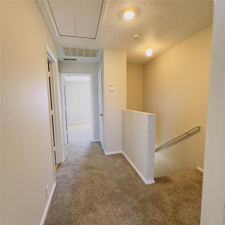 1414 Hardned Lane Dallas, TX 75217 - Photo 6 of 13 a view of a hallway with closet