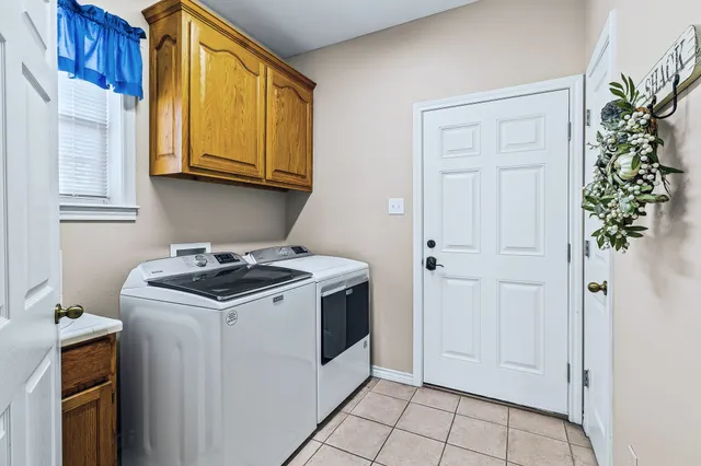 a view of a kitchen with appliances and cabinets