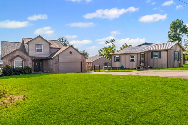 a view of a back yard of the house