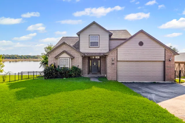 a house view with a garden space
