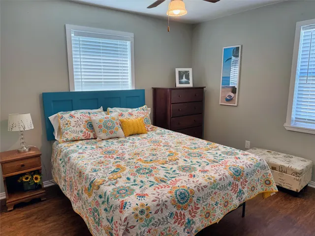 a bathroom with a sink toilet and mirror