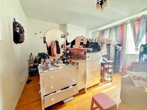 a room with gym equipment and a mirror
