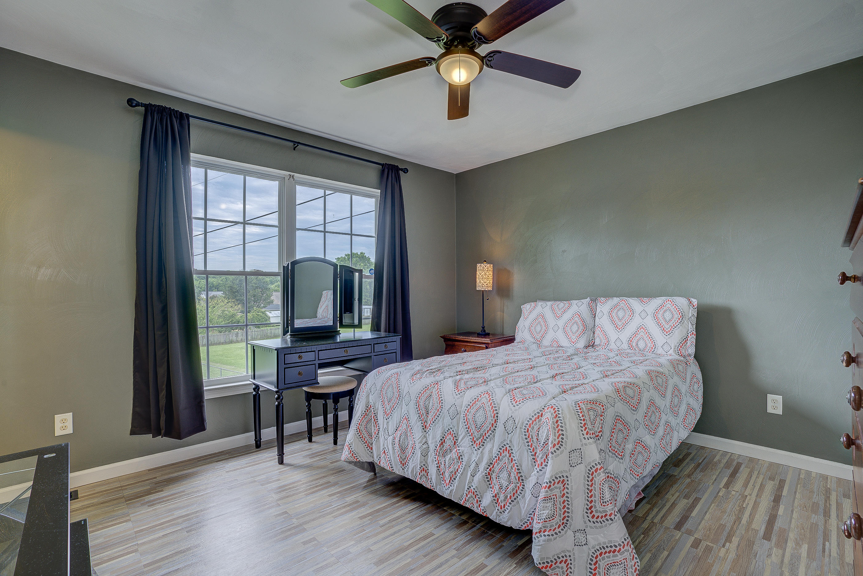 4410 Cove Road Roanoke, VA 24017 - Photo 16 of 32 a bedroom with a bed and a desk