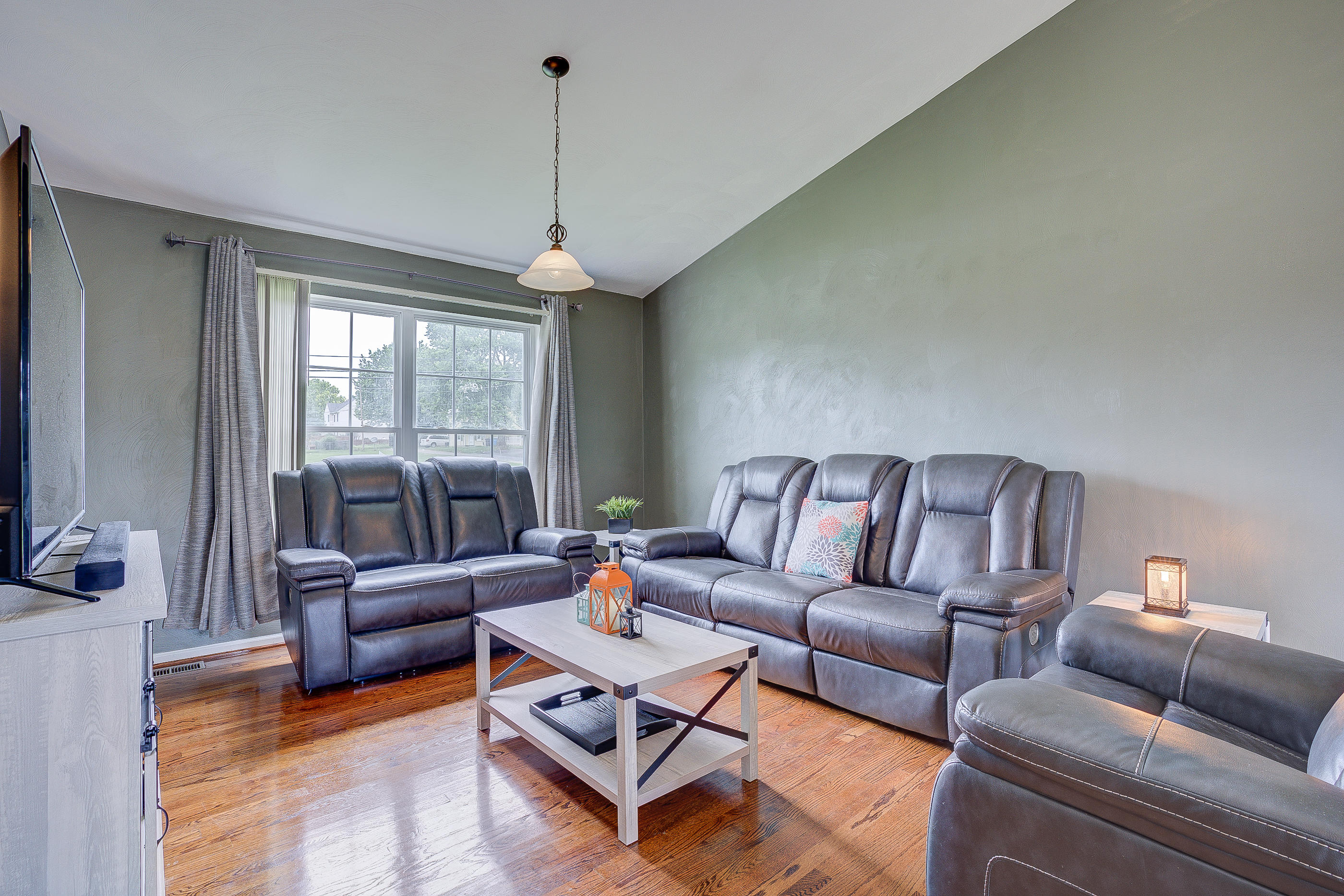 4410 Cove Road Roanoke, VA 24017 - Photo 3 of 32 a living room with furniture and a chandelier