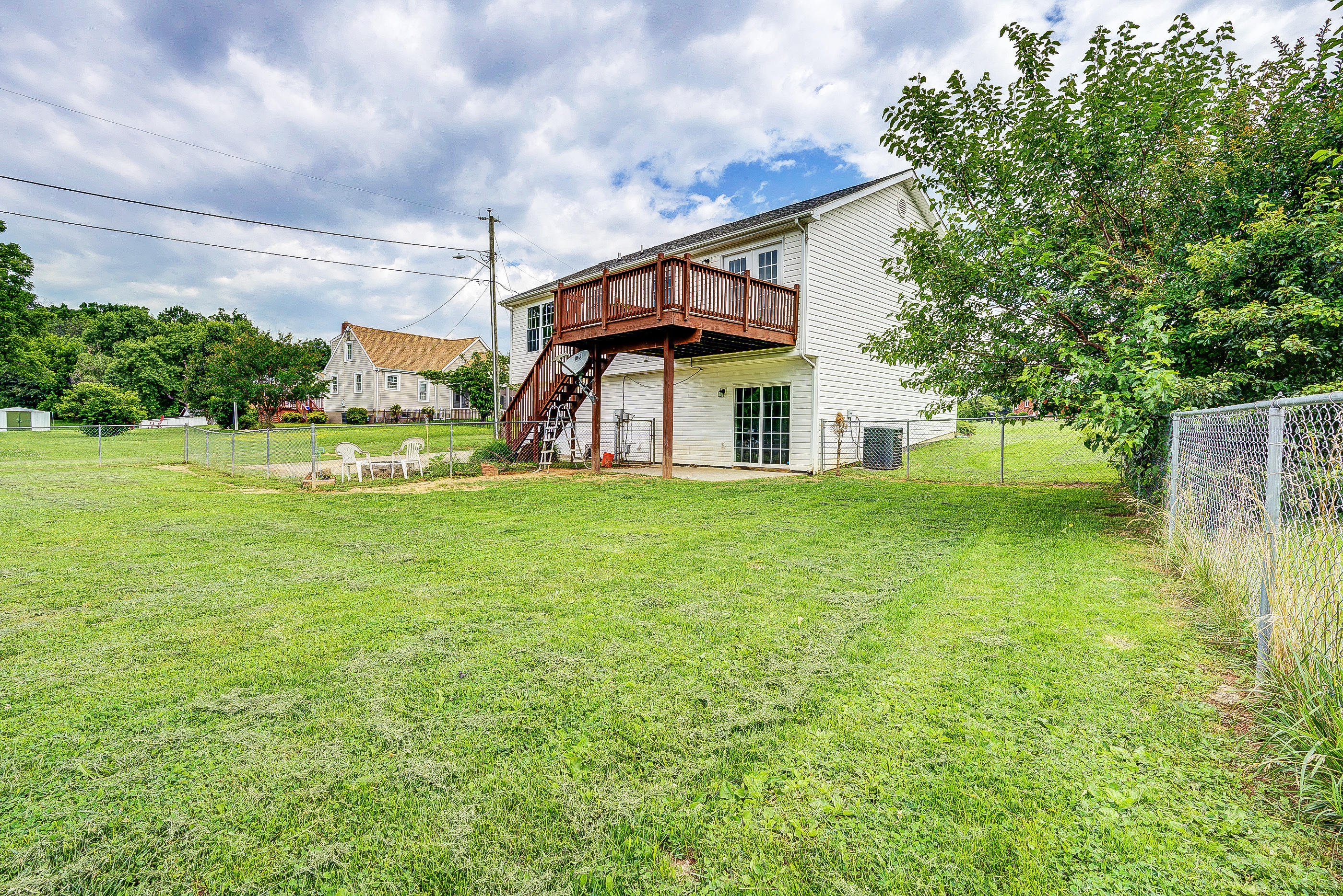4410 Cove Road Roanoke, VA 24017 - Photo 31 of 32 a view of a house with a yard and sitting area