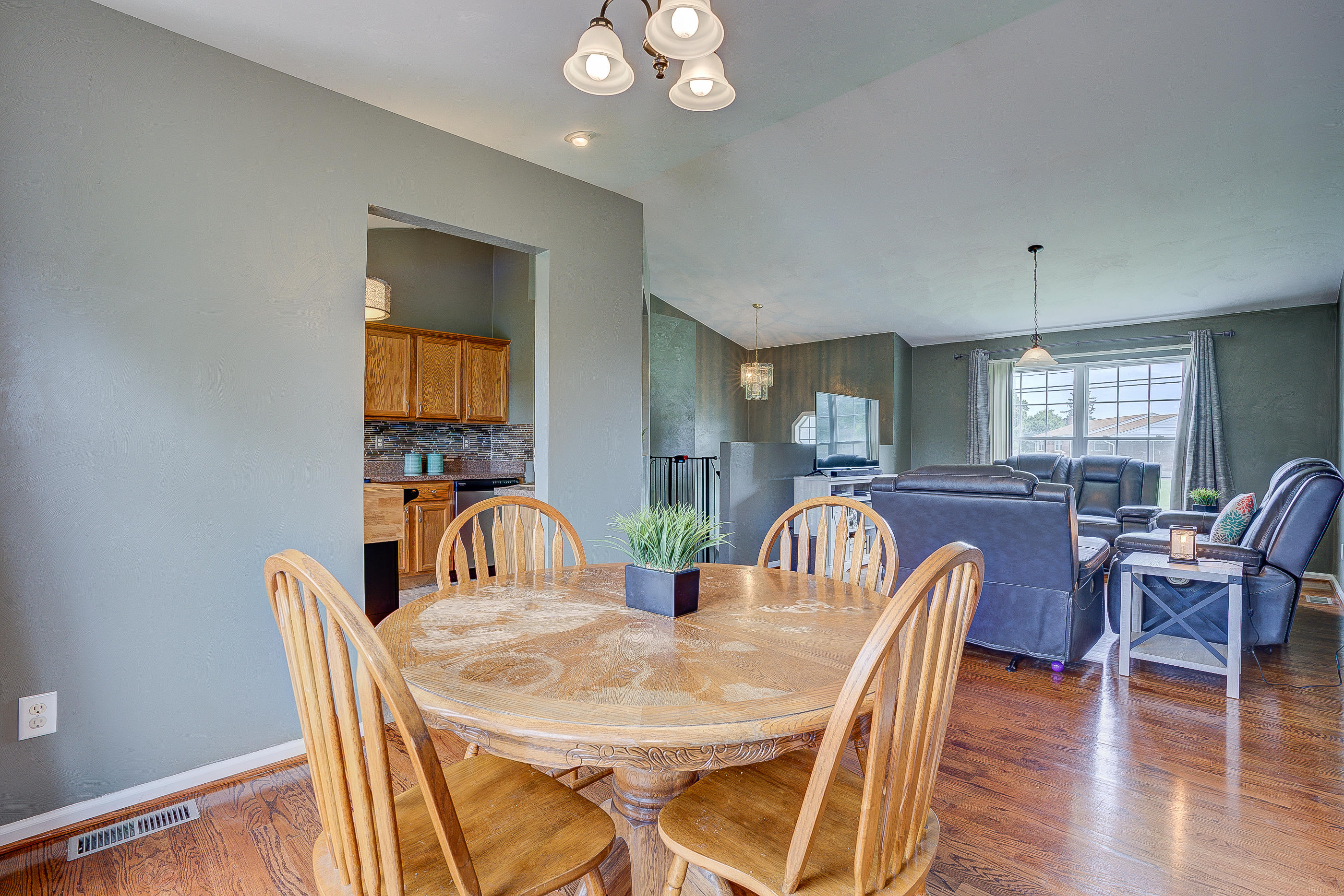 4410 Cove Road Roanoke, VA 24017 - Photo 8 of 32 a view of a dining room with furniture and wooden floor