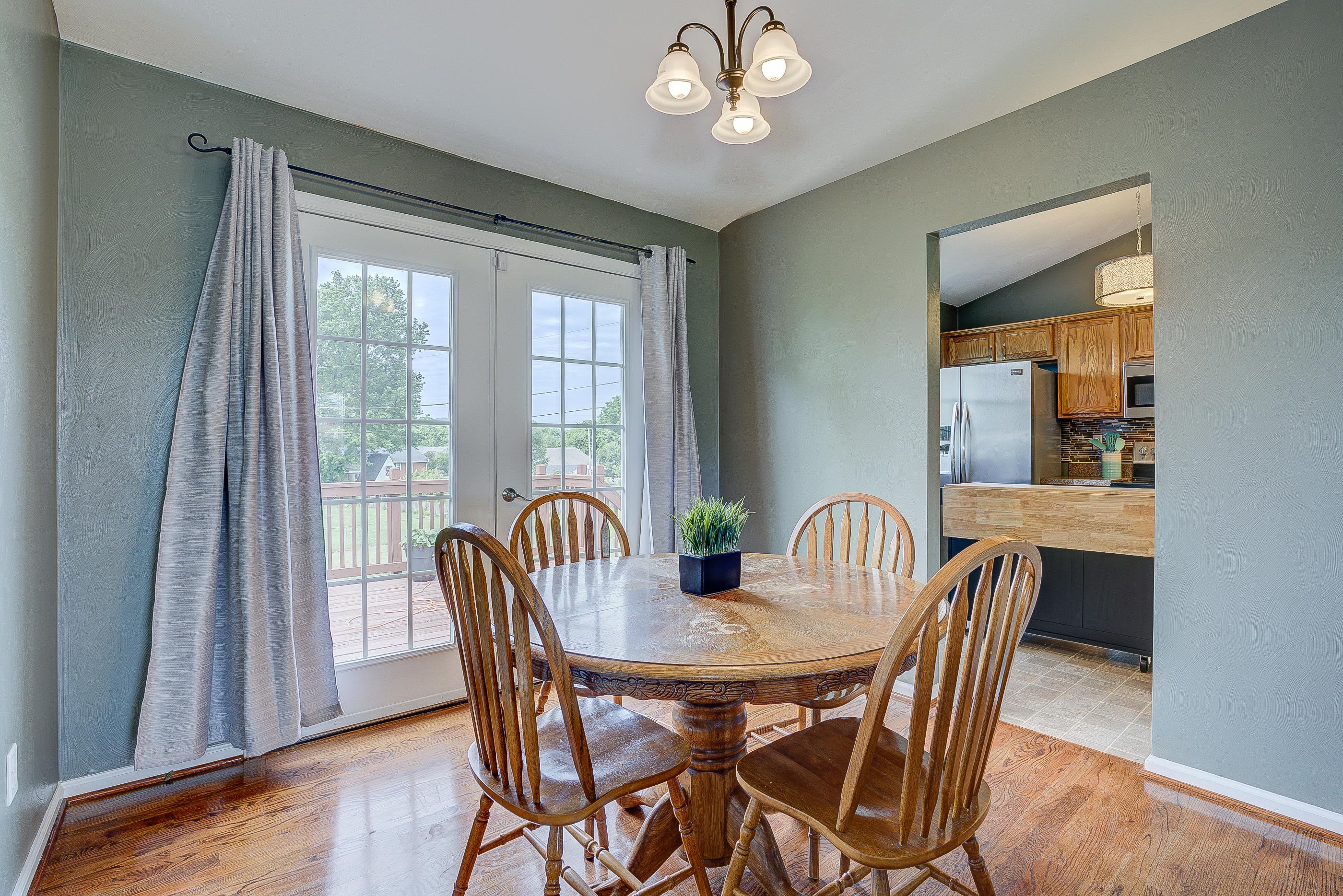 4410 Cove Road Roanoke, VA 24017 - Photo 9 of 32 a view of a dining room with furniture window and wooden floor