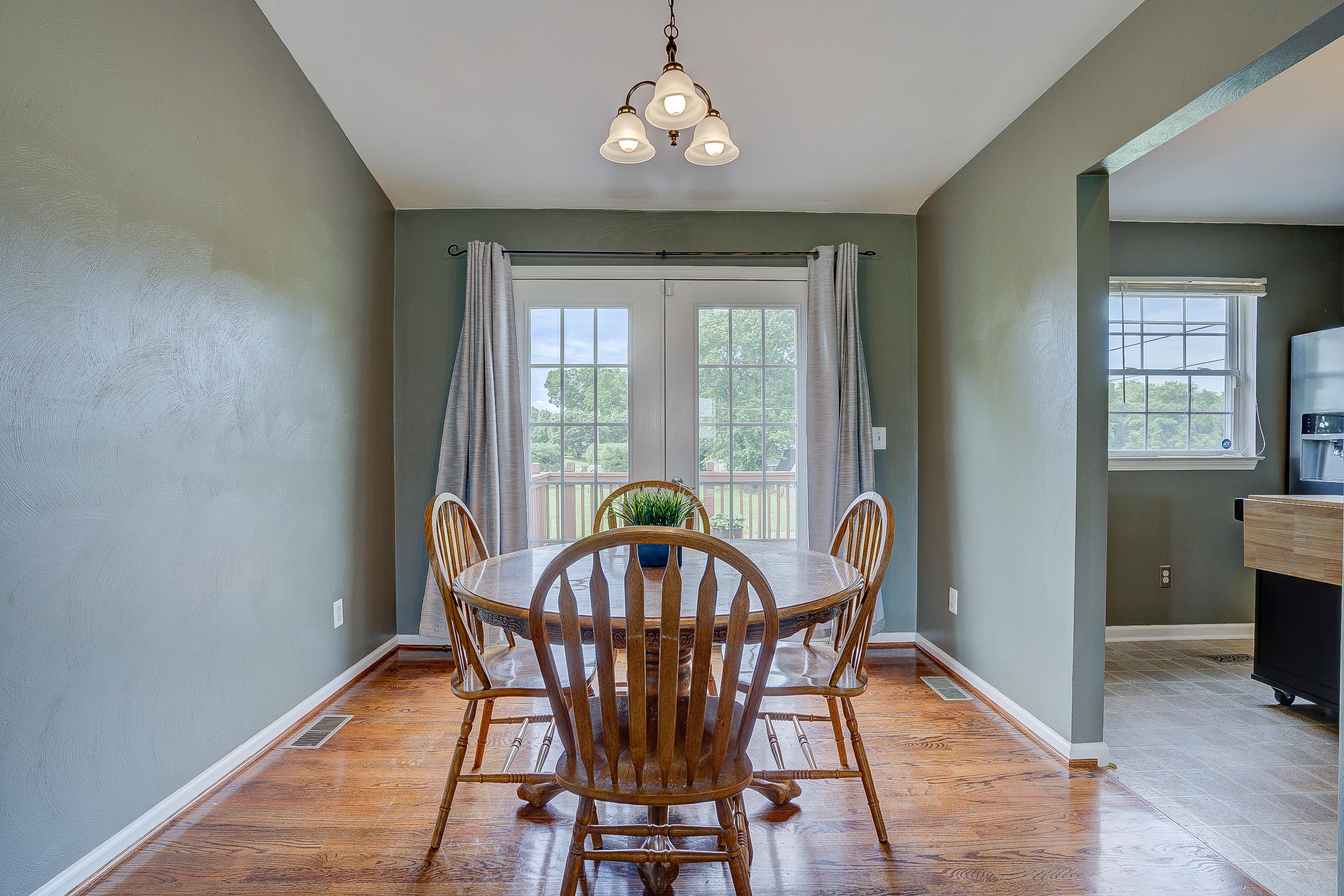 4410 Cove Road Roanoke, VA 24017 - Photo 10 of 32 a view of a dining room with furniture window and wooden floor