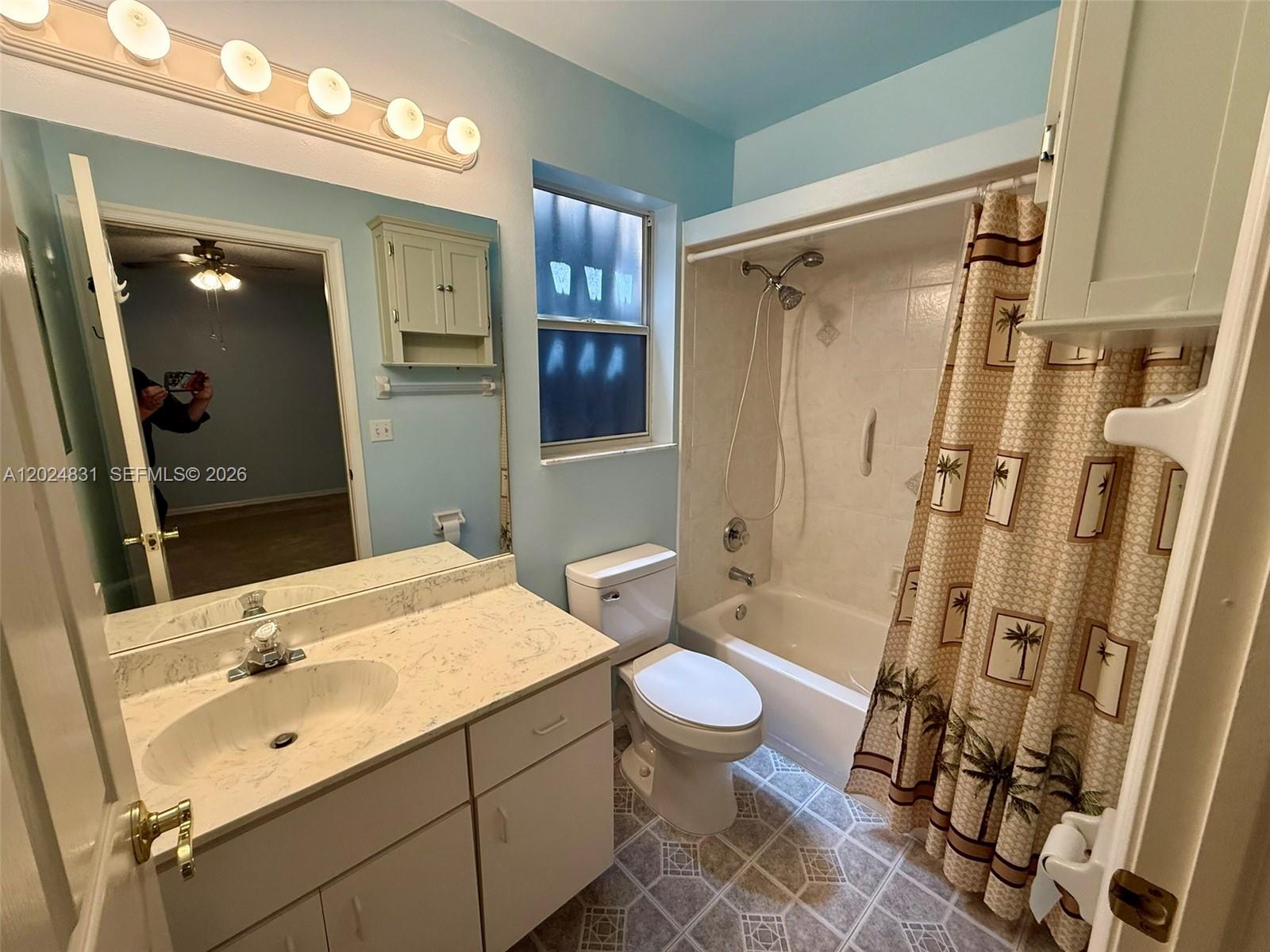 15819 76th Road North Loxahatchee, FL 33470 - Photo 35 of 45 a bathroom with a sink toilet tub and shower