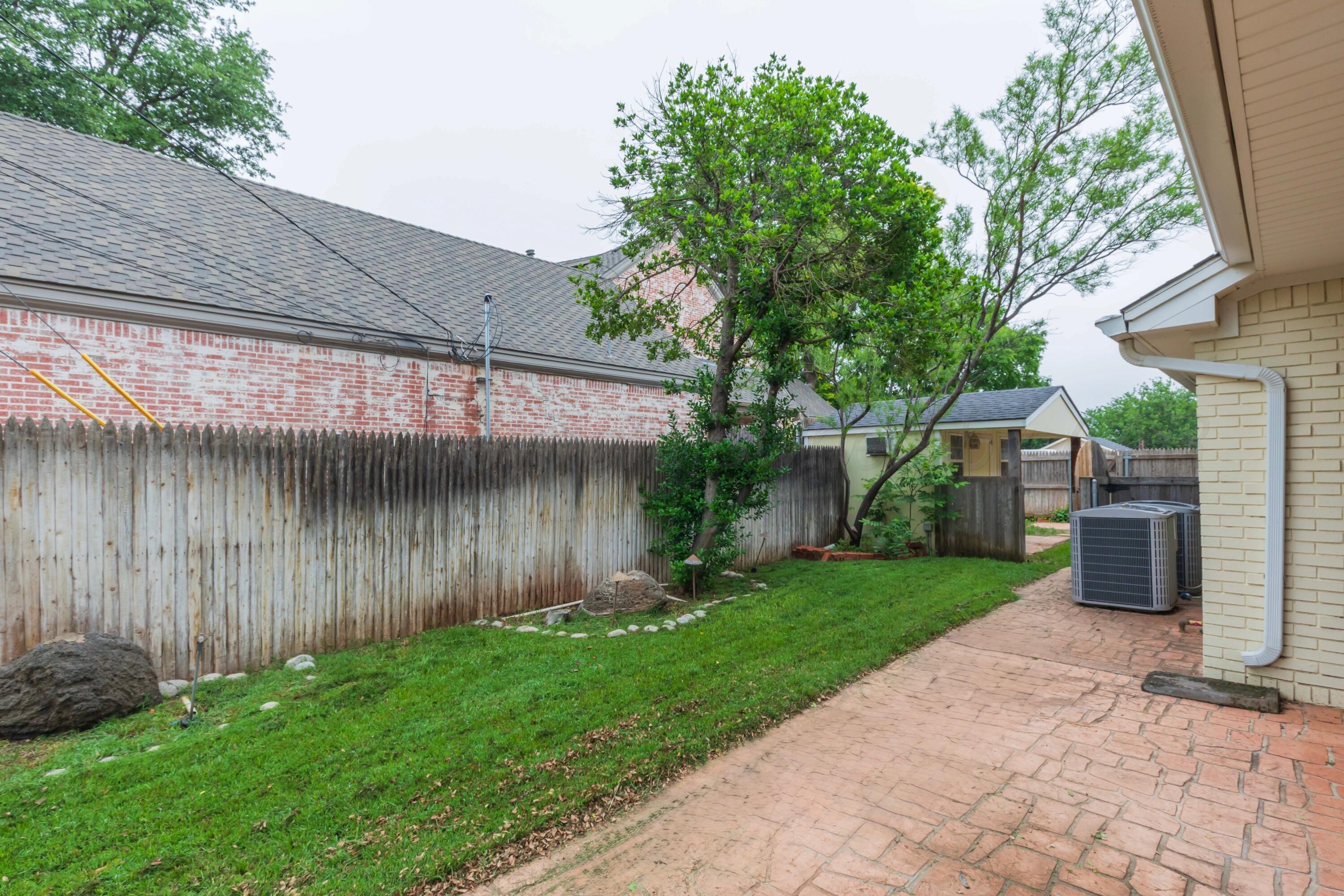 4102 Paramount Boulevard Amarillo, TX 79109 - Photo 13 of 73 a view of a back yard of the house