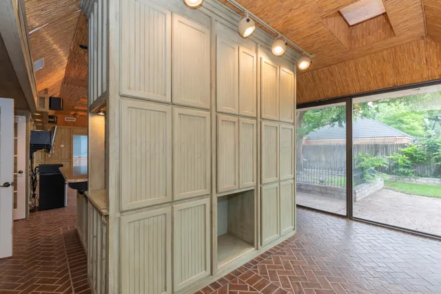 a kitchen with stainless steel appliances granite countertop a sink and cabinets