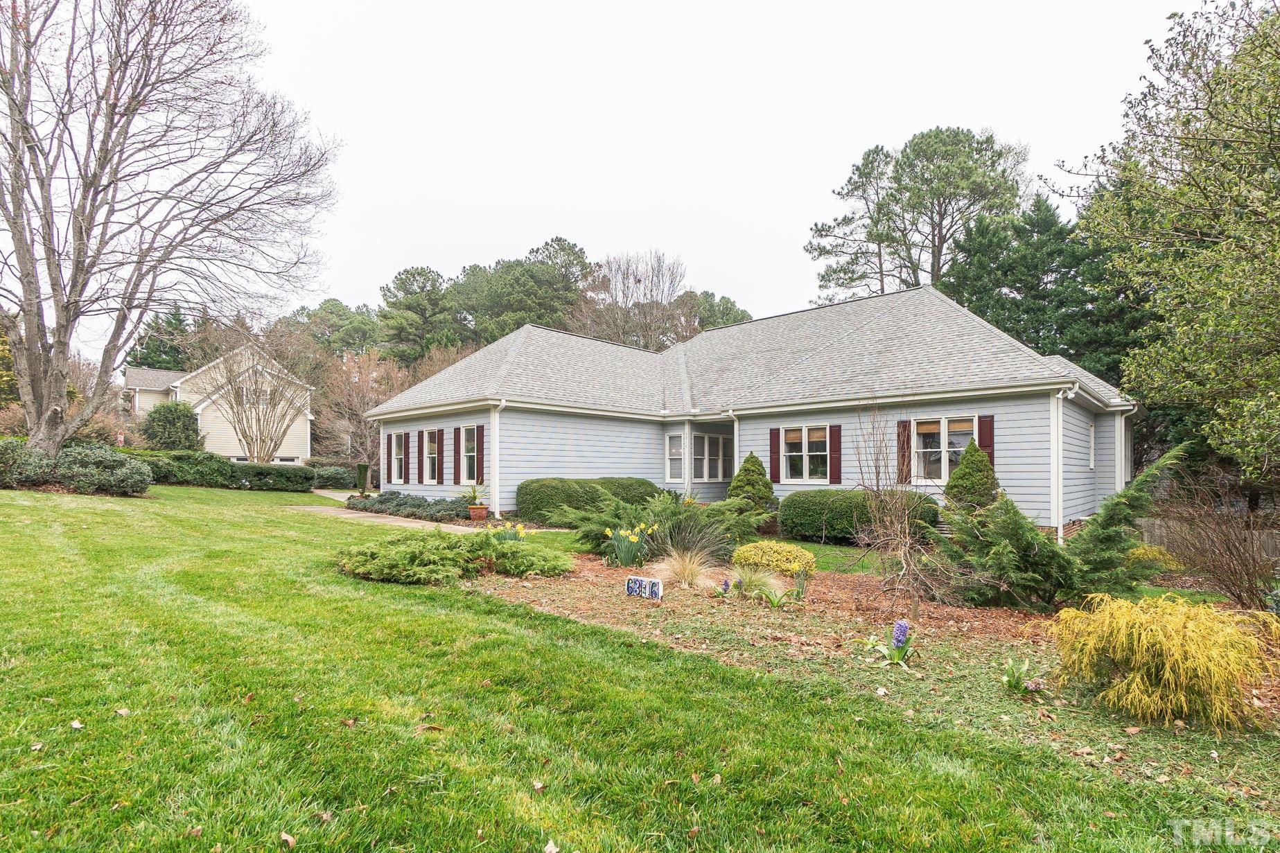 6316 Ashley Ridge Drive Raleigh, NC 27612 - Photo 3 of 45 a front view of a house with a yard