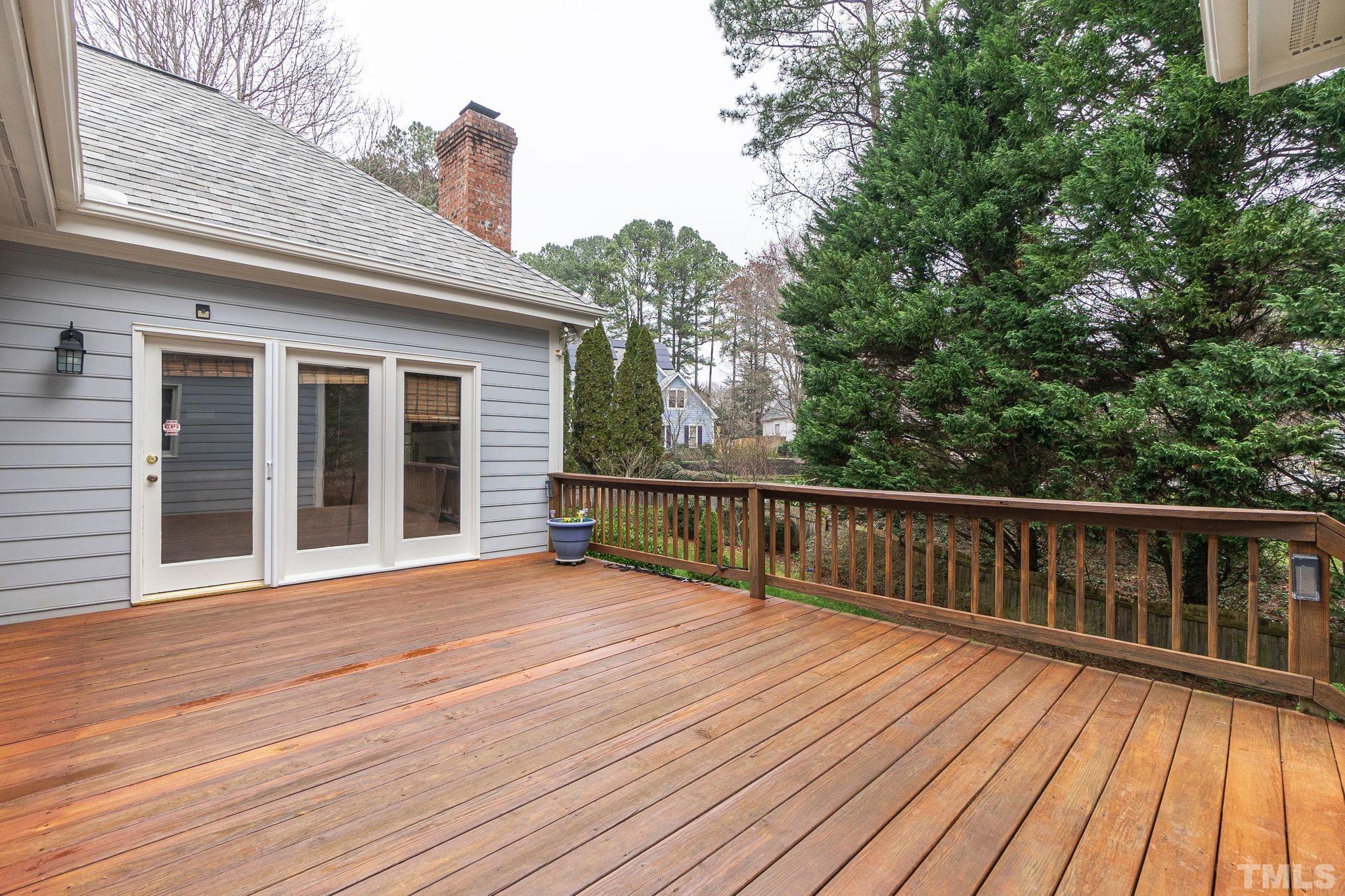 6316 Ashley Ridge Drive Raleigh, NC 27612 - Photo 40 of 45 a view of balcony with wooden floor and fence