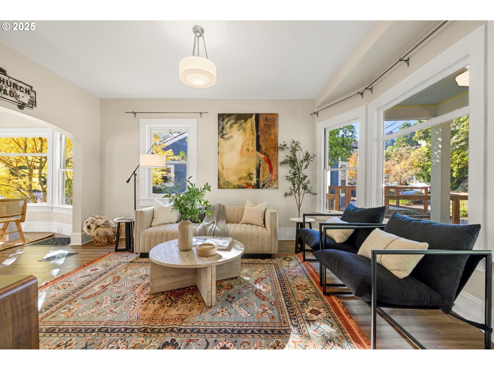 3312 South Corbett Avenue Portland, OR 97239 - Photo 12 of 48 a living room with furniture and a large window
