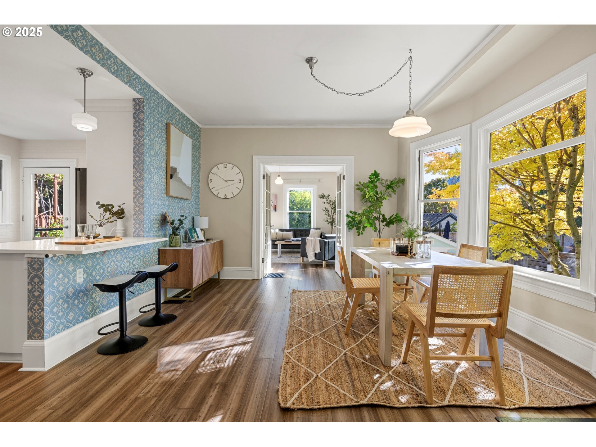 3312 South Corbett Avenue Portland, OR 97239 - Photo 13 of 48 a view of a dining room with furniture window and wooden floor