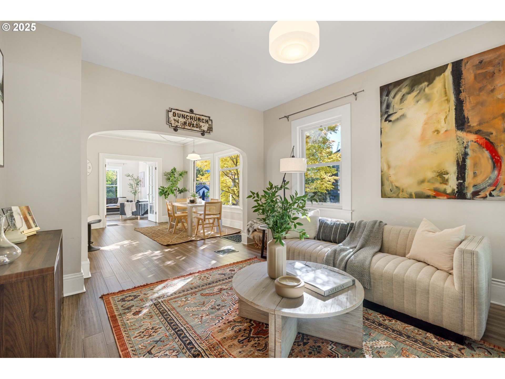 3312 South Corbett Avenue Portland, OR 97239 - Photo 10 of 48 a living room with furniture and a large window