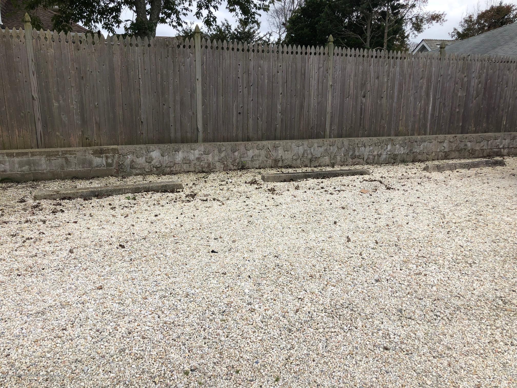 632 Main Avenue, Unit 5 Point Pleasant Beach, NJ 08742 - Photo 15 of 16 a view of wooden fence