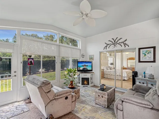 a kitchen with stainless steel appliances a stove a sink and a microwave